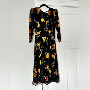 ASTR the Label black dress with marigold flowers